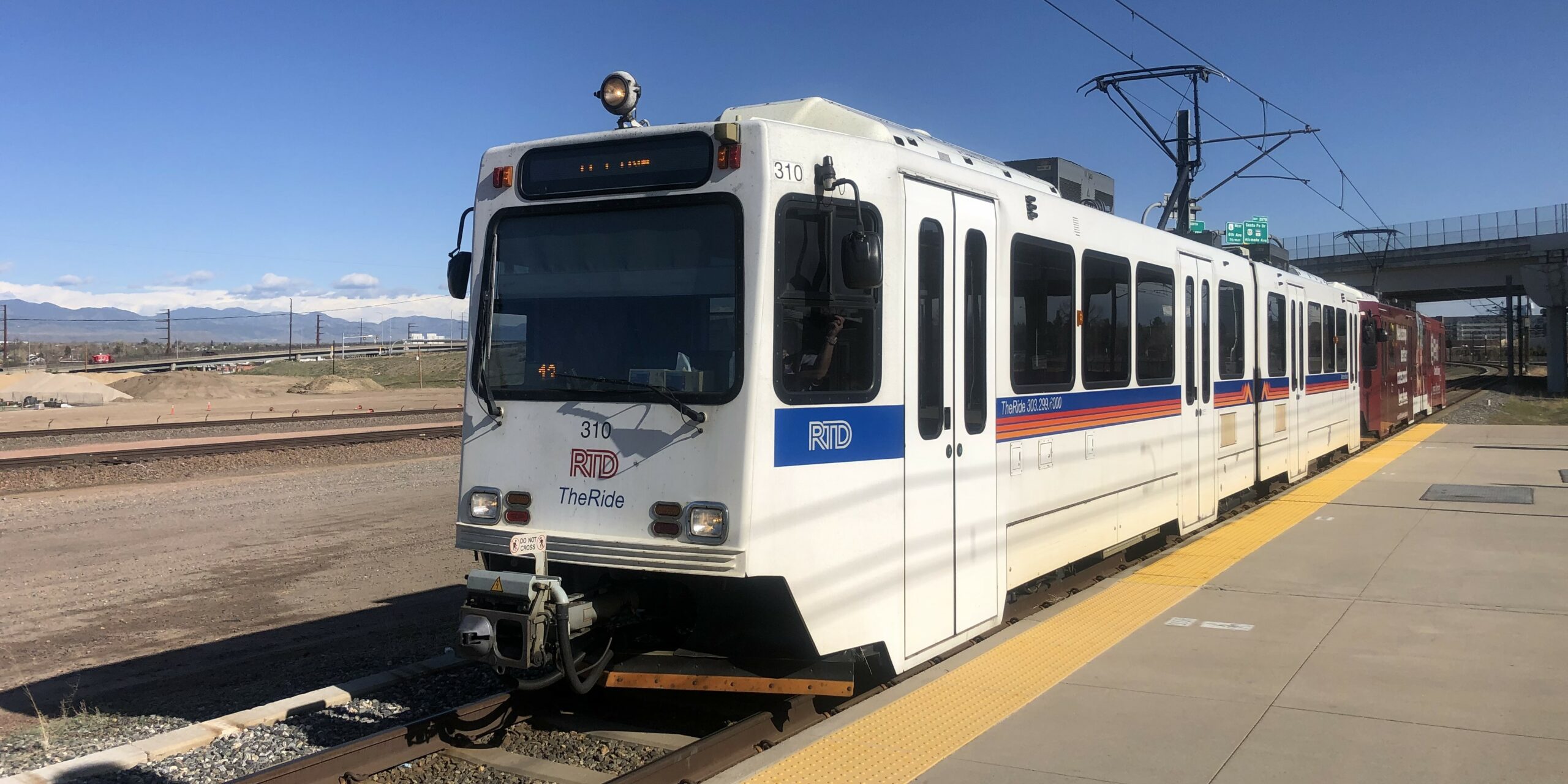 D Line train at I-25 & Broadway Station.